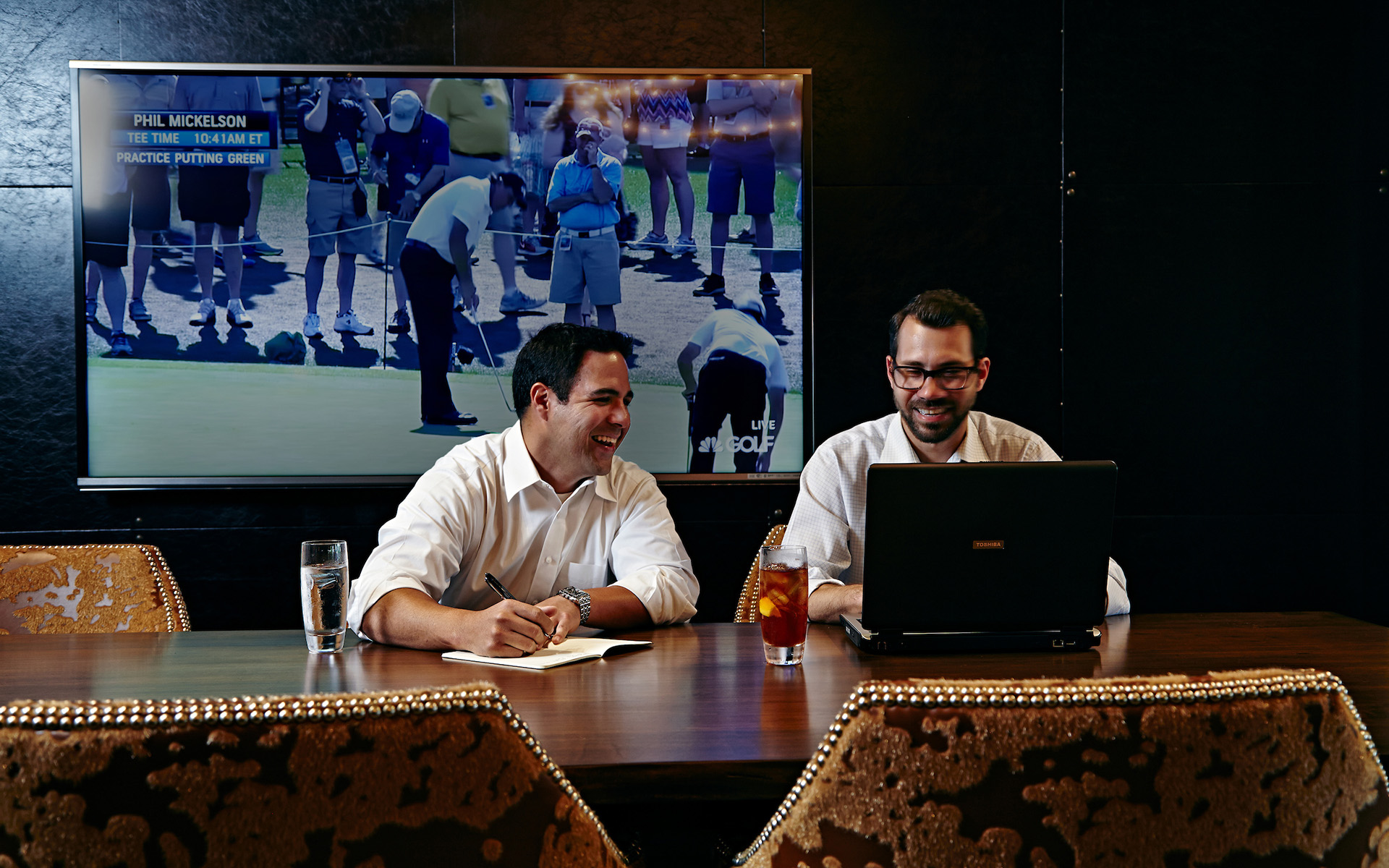 Coworkers collaborating in an event room at Ardea